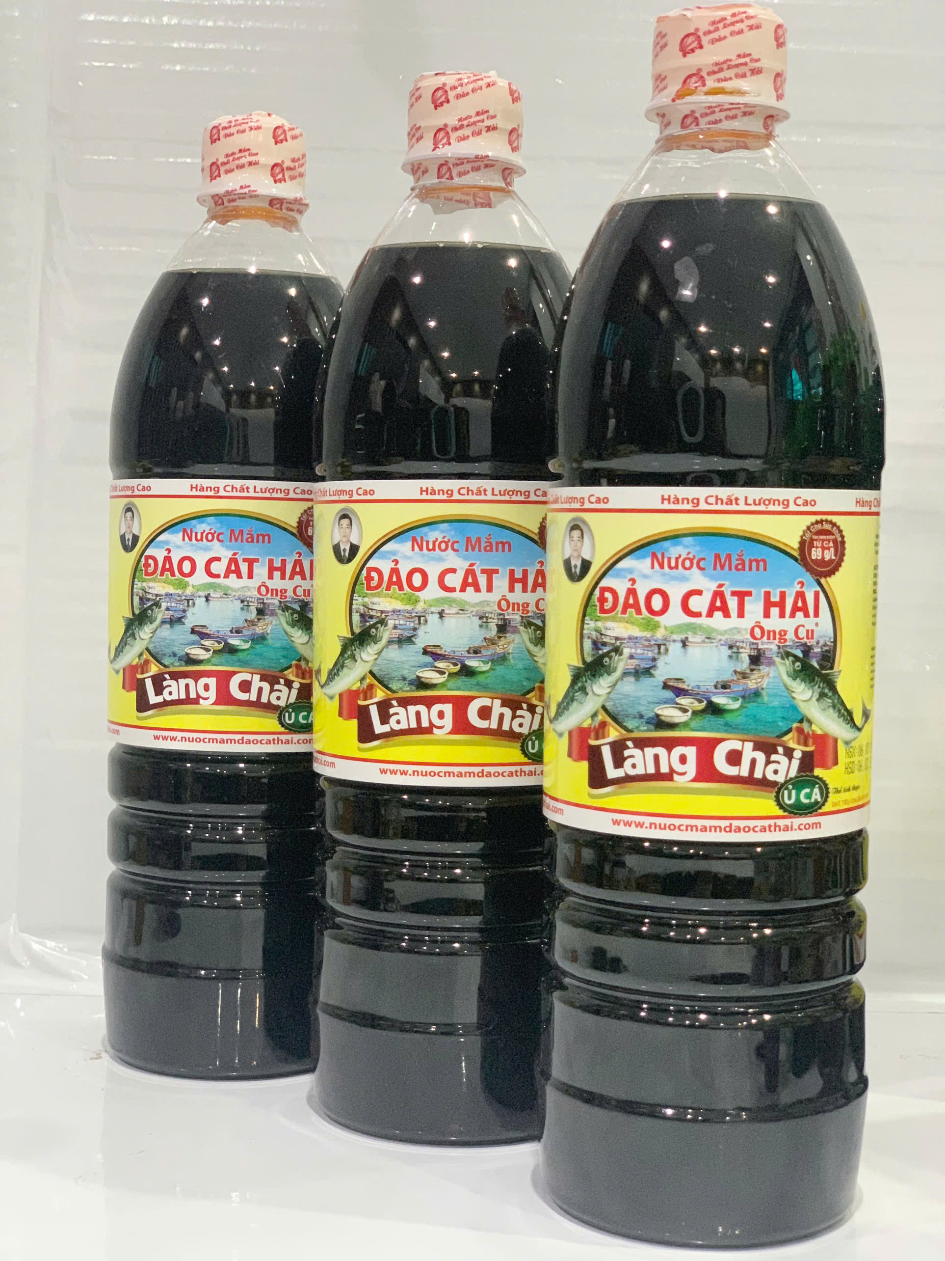 NƯỚC MẮM LÀNG CHÀI Ủ CÁ  - DUNG TÍCH 1L ( CHAI)